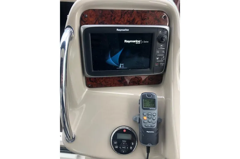 Slide: The Image of Control panel of 2008 Sea Ray 340 Sundancer with Raymarine electronics. - 11