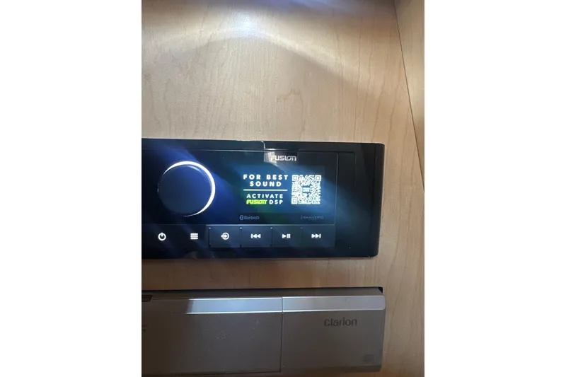 Slide: The Image of Fusion audio system on 2008 Sea Ray 340 Sundancer boat, featuring Bluetooth and DSP activation. - 12