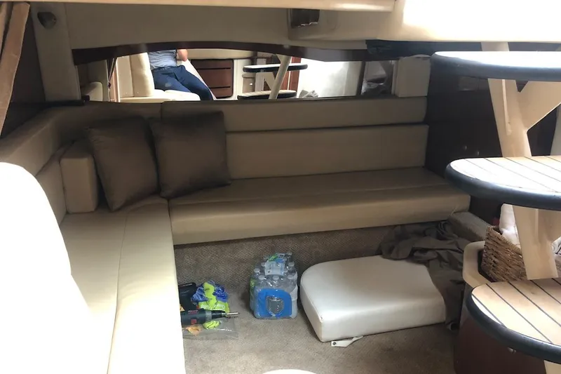 Slide: The Image of Interior of 2008 Sea Ray 340 Sundancer yacht with beige seating and modern design. - 24