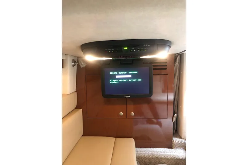 Slide: The Image of Interior of 2008 Sea Ray 340 Sundancer with screen displaying serial number message. - 25