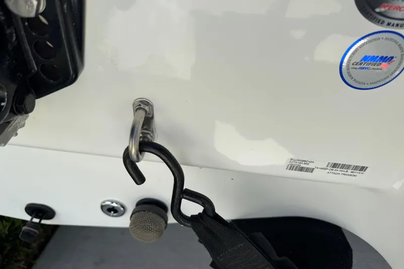 Slide: The Image of 2024 Tahoe 185 S boat transom with hook and certification sticker. - 10
