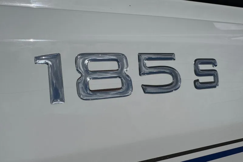 Slide: The Image of Chrome "185 S" emblem on 2024 Tahoe model boat. - 21