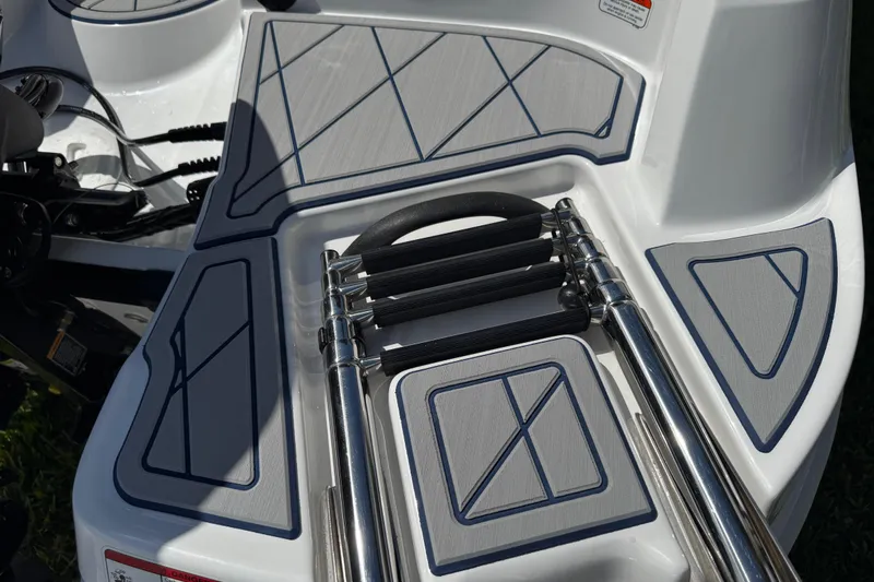 Slide: The Image of 2024 Tahoe 185 S boat swim platform with foldable ladder and non-slip surface. - 29