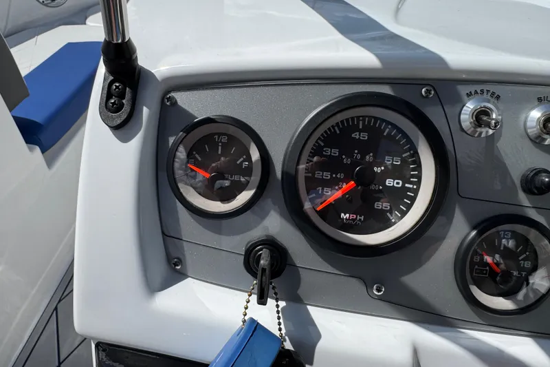 Slide: The Image of Dashboard of 2024 Tahoe 185 S boat with speedometer and fuel gauge. - 45
