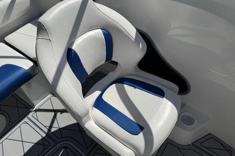 Slide: The Image of 2024 Tahoe 185 S boat seat with white and blue upholstery. - 50