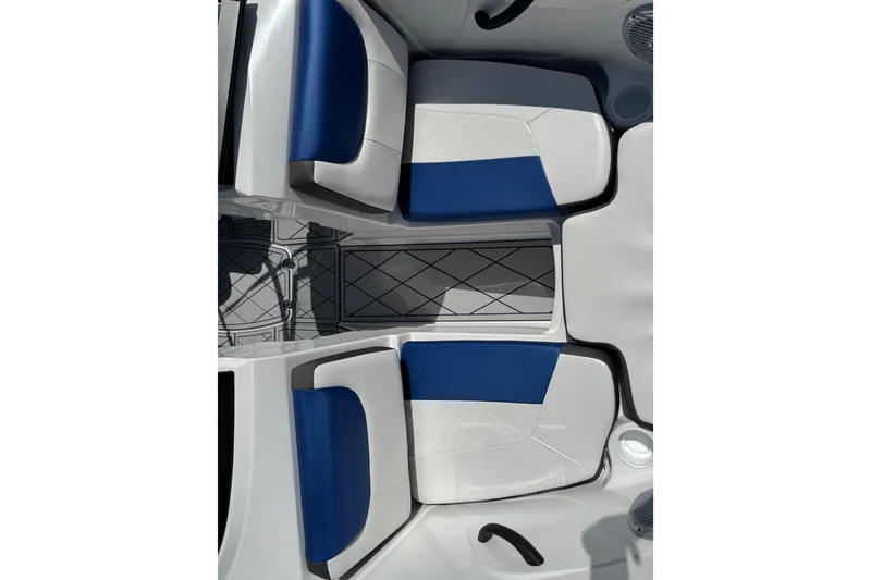 Slide: The Image of 2024 Tahoe 185 S boat interior with blue and white cushioned seating. - 57
