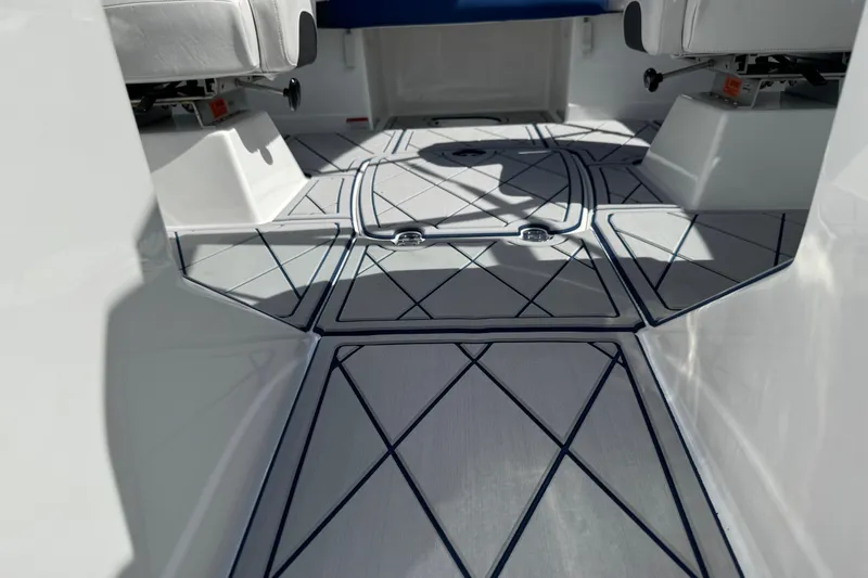 Slide: The Image of 2024 Tahoe 185 S boat interior with sleek, modern flooring design. - 63