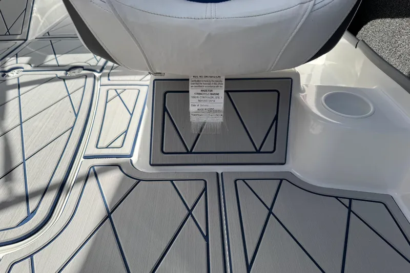 Slide: The Image of 2024 Tahoe 185 S boat interior with sleek, modern flooring and seating. - 72