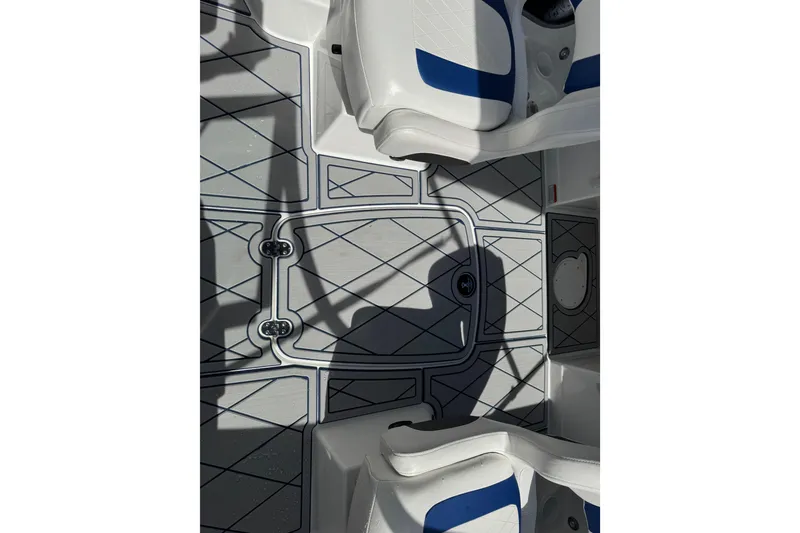 Slide: The Image of 2024 Tahoe 185 S boat interior with stylish seating and modern flooring design. - 82