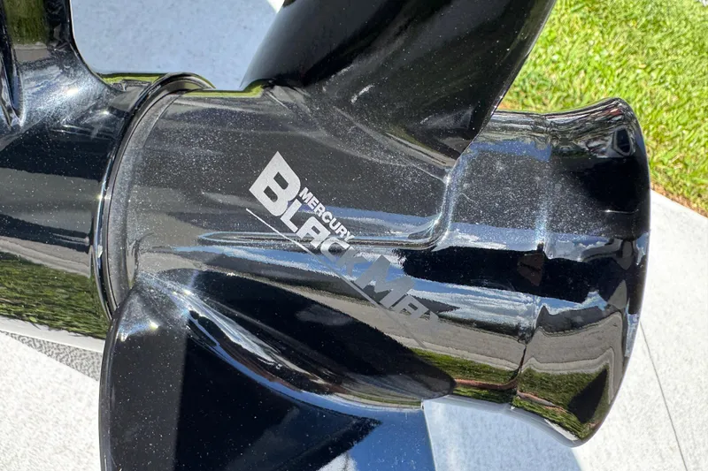 Slide: The Image of Close-up of a Mercury Black Max propeller on a 2024 Tahoe 185 S boat. - 9