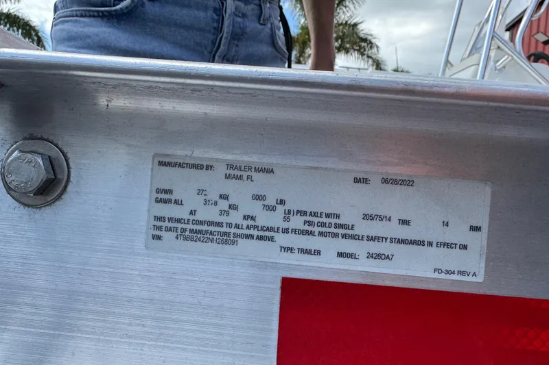 Slide: The Image of Sticker on a 2024 Tahoe 185 S trailer, detailing manufacturing and safety information. - 95