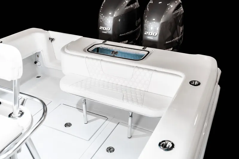 Slide: The Image of Manufacturer Provided Image: 2026 Contender 32 ST boat interior with dual engines and seating area. - 6
