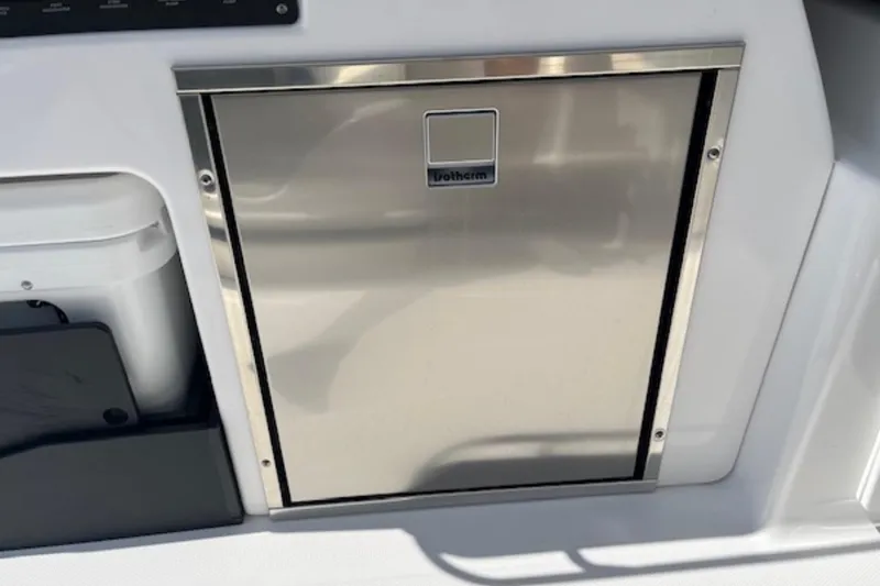 Slide: The Image of 2024 Blackfin 302 DC boat interior with stainless steel Isotherm refrigerator. - 24