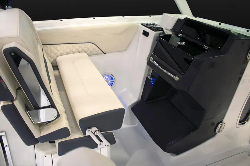 Slide: The Image of 2024 Blackfin 302 DC boat with adjustable seating and sleek design. - 9