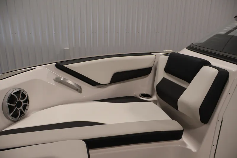 Slide: The Image of 2020 Yamaha Boats 195S interior seating with black and white upholstery and speaker. - 15