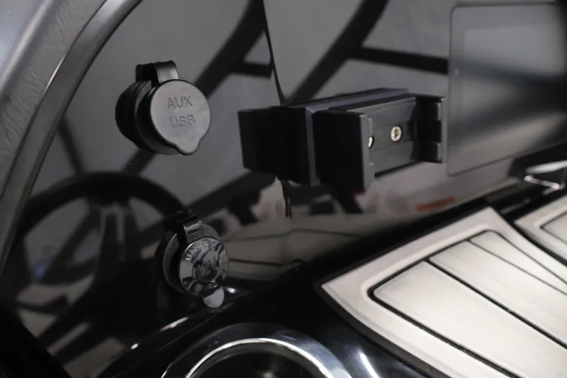 Slide: The Image of Dashboard of 2020 Yamaha Boats 195S with AUX and USB ports. - 23