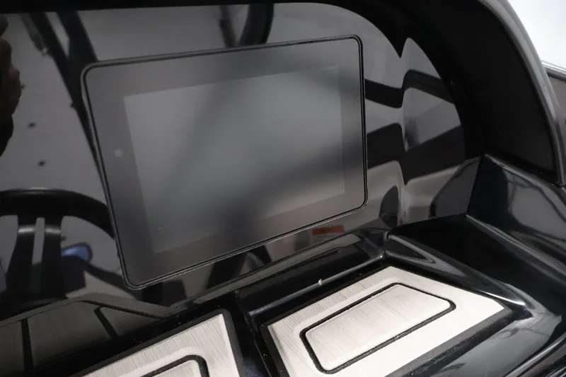 Slide: The Image of 2020 Yamaha Boats 195S dashboard with touchscreen display and sleek black design. - 24