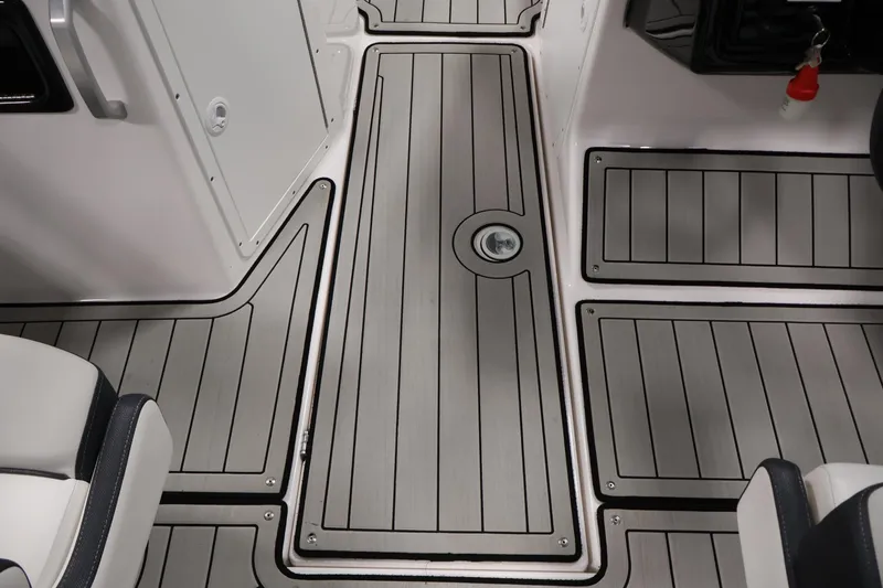 Slide: The Image of 2020 Yamaha Boats 195S interior with sleek, modern deck design and comfortable seating. - 31