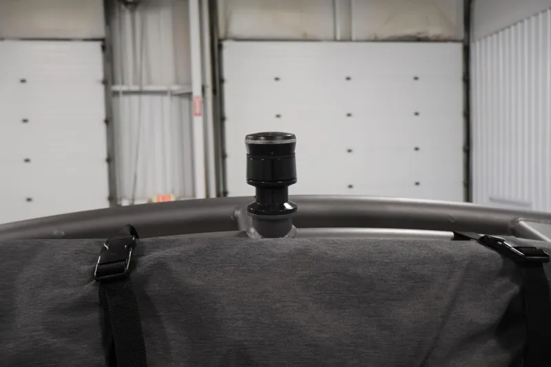 Slide: The Image of 2020 Yamaha Boats 195S with covered bow in indoor storage. - 41