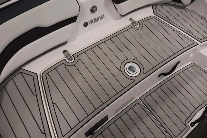 Slide: The Image of 2020 Yamaha Boats 195S deck with sleek, modern design and durable flooring. - 43