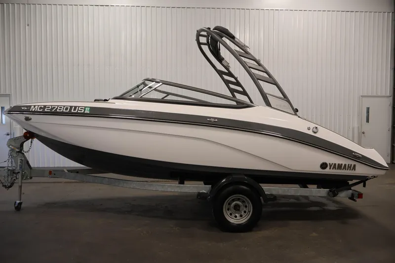 Slide: The Image of 2020 Yamaha Boats 195S on trailer in indoor setting. - 8