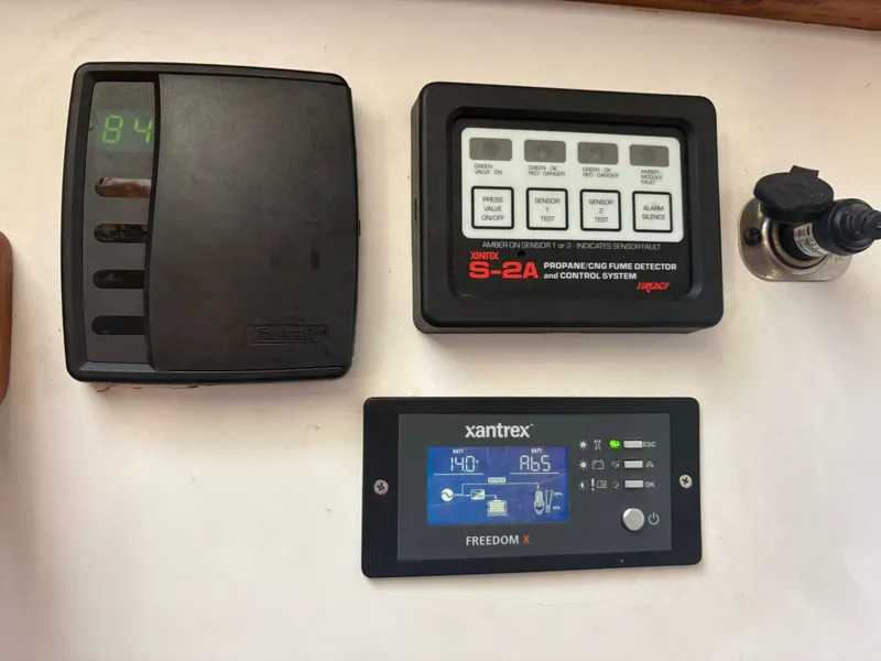 Slide: The Image of Control systems on a 1983 Wilbur 38 Flybridge boat. - 35