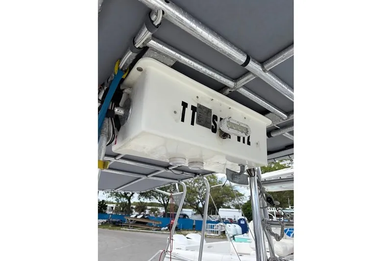 Slide: The Image of 2009 Eduardono RIB boat canopy with mounted equipment and visible wiring. - 14