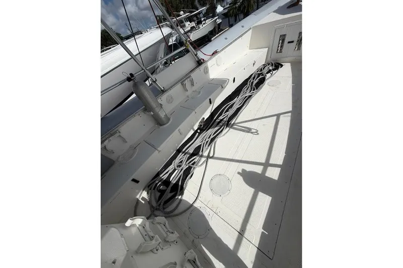 Slide: The Image of 2009 Eduardono RIB boat deck with coiled ropes and equipment. - 18