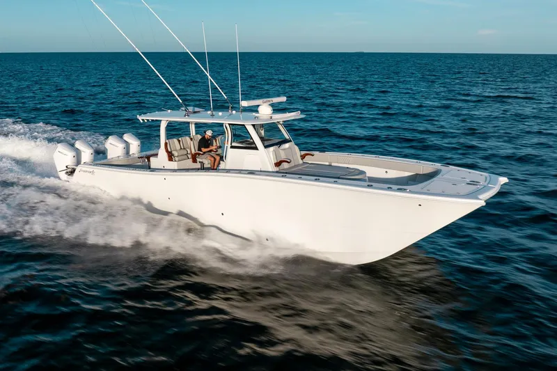 Slide: The Image of 2023 Freeman 43 boat cruising on open ocean waters. - 11