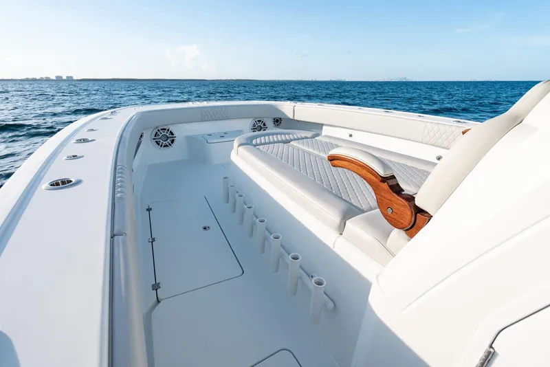 Slide: The Image of Luxurious 2023 Freeman 43 boat interior with cushioned seating and ocean view. - 33