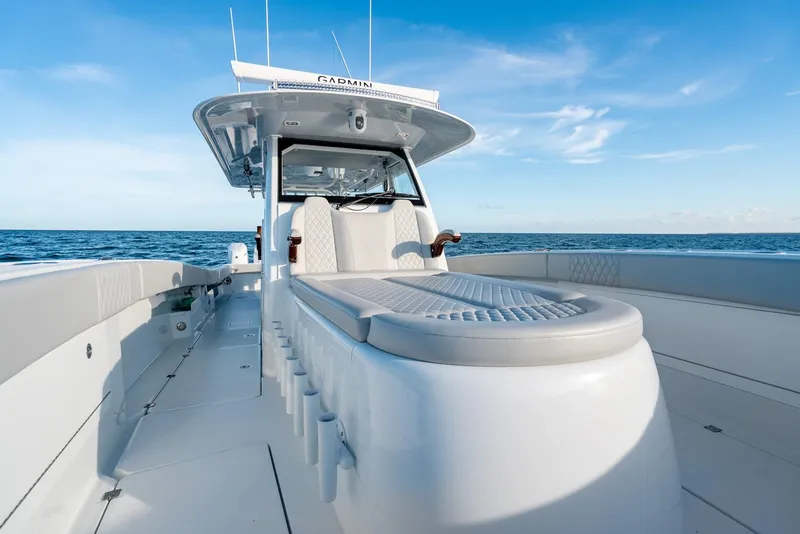Slide: The Image of 2023 Freeman 43 boat on open sea, featuring sleek design and modern amenities. - 36