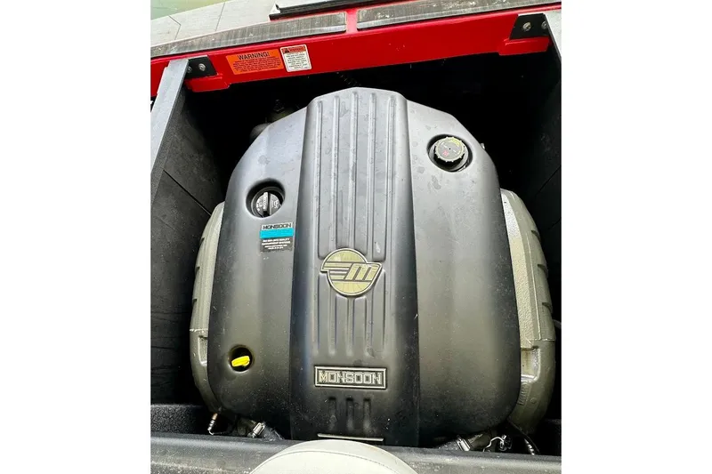 Slide: The Image of 2021 Axis A20 boat engine, Monsoon cover, black and red design. - 12