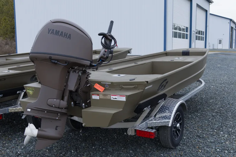 Slide: The Image of 2026 G3 Gator Tough 16 DK boat with Yamaha outboard motor on trailer. - 3