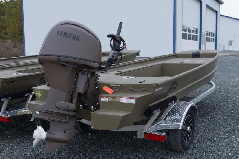 Slide: The Image of 2026 G3 Gator Tough 16 DK boat with Yamaha outboard motor on trailer. - 5