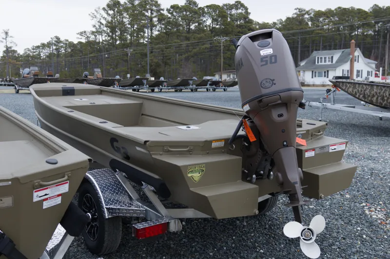 Slide: The Image of 2026 G3 Gator Tough 16 DK boat with Yamaha 50 outboard motor on trailer. - 6