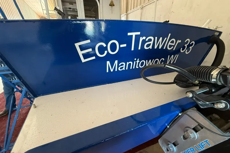 Slide: The Image of Blue Eco-Trawler 33 boat, Manitowoc WI, 2013 model, in a storage facility. - 12