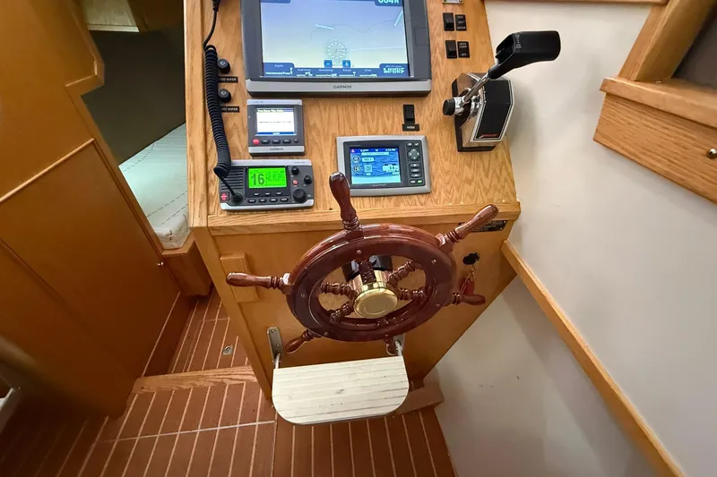 Slide: The Image of Eco-Trawler 33 helm with navigation equipment and wooden steering wheel, 2013 model. - 20