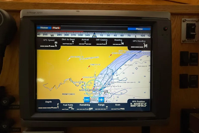 Slide: The Image of GPS navigation screen on 2013 Eco-Trawler 33, displaying nautical chart and coordinates. - 22