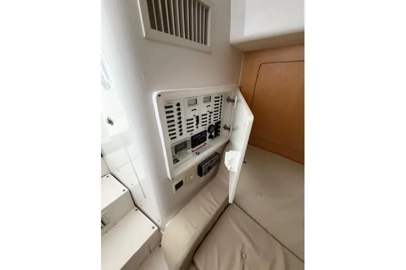 Slide: The Image of 2009 Intrepid 377 Walkaround interior control panel with open access door. - 32