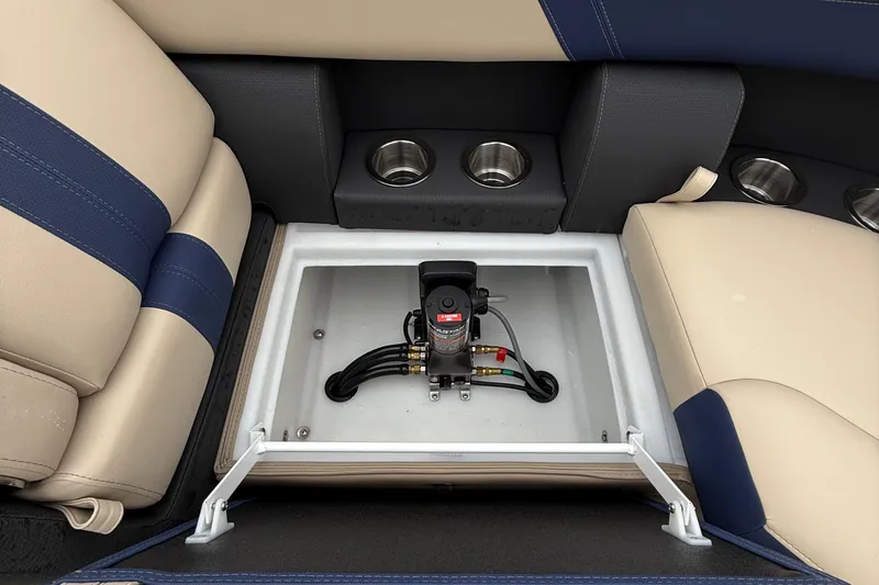 Slide: The Image of 2026 Berkshire 22RFX CTS boat seating with storage compartment and cup holders. - 18