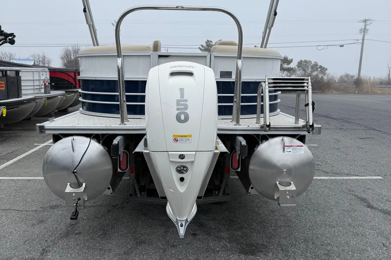Slide: The Image of 2026 Berkshire 22RFX CTS pontoon boat with Mercury 150 outboard motor, rear view. - 7