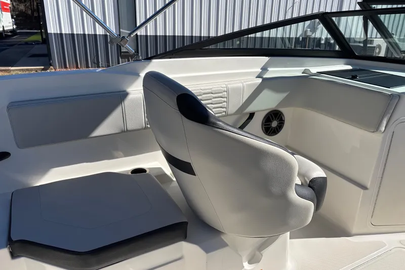 Slide: The Image of 2023 Sea Ray SPX 210 Outboard interior with sleek seating and modern design. - 21
