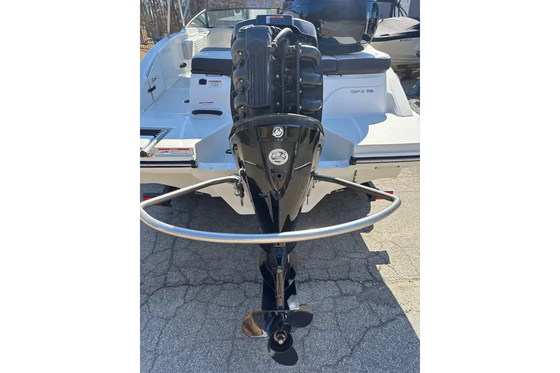 Slide: The Image of 2023 Sea Ray SPX 210 Outboard boat, rear view with engine and propeller. - 25