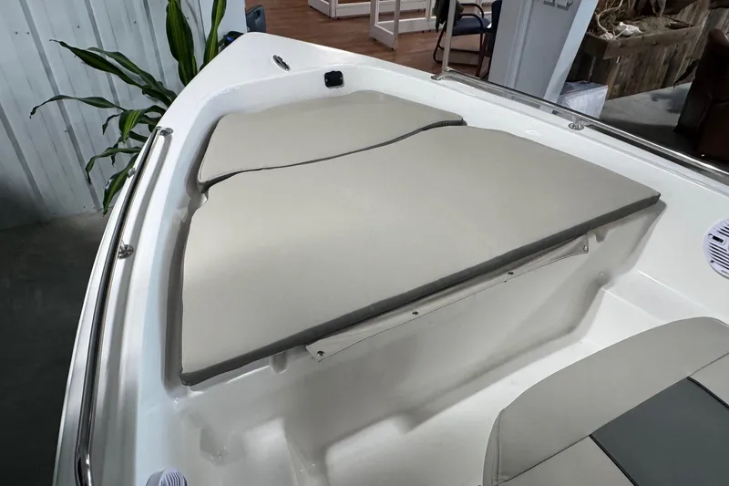 Slide: The Image of 2026 Key West 1720 Center Console boat interior with cushioned seating. - 12