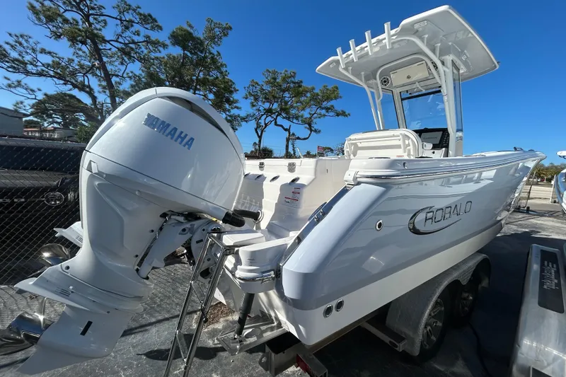 The Image of 2026 Robalo R250 Center Console boat with Yamaha engine, parked outdoors. - 0