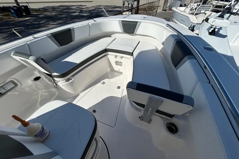 Slide: The Image of 2026 Robalo R250 Center Console boat interior with spacious seating and modern design. - 5