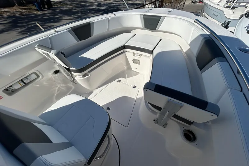 Slide: The Image of 2026 Robalo R250 Center Console boat interior with spacious seating and modern design. - 8