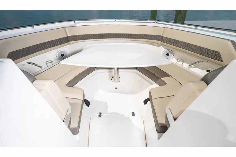 Slide: The Image of Interior of 2021 Pursuit DC 326 Dual Console with seating area. - 8