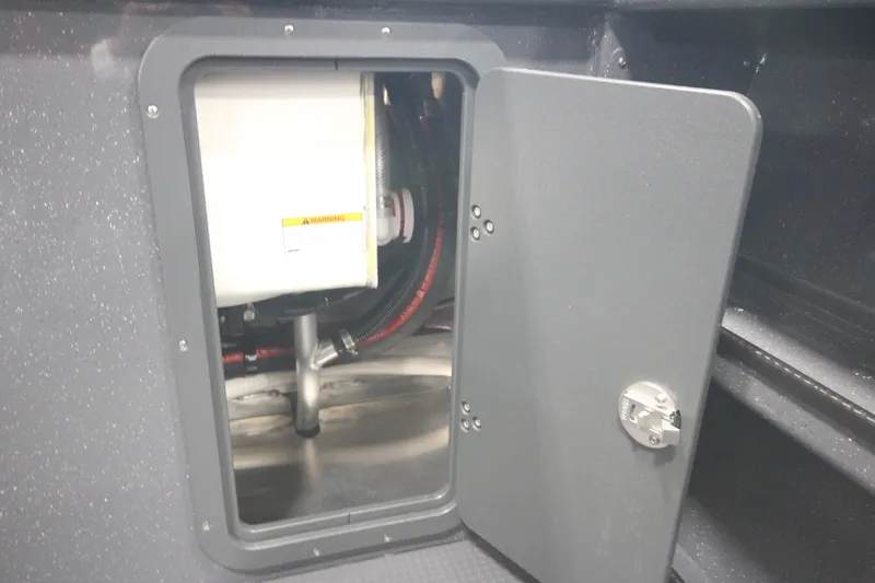 Slide: The Image of Access panel of 2026 Weldcraft 240 Ocean King F300XCB boat, showing internal components. - 15