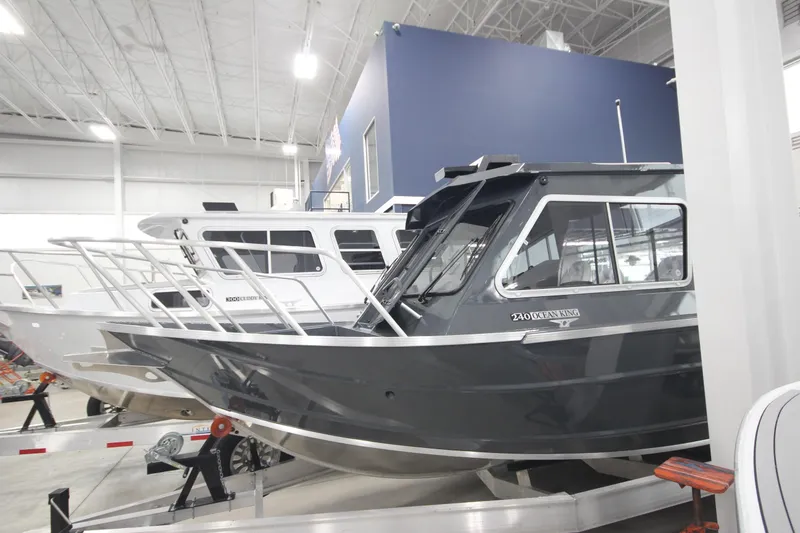 Slide: The Image of 2026 Weldcraft 240 Ocean King F300XCB boat displayed indoors. - 5